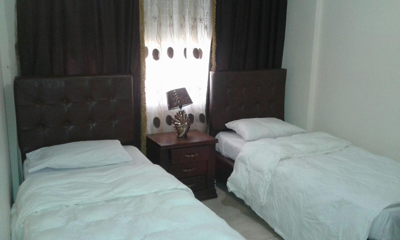 Al Tawheed Hotel Apartments Амман Екстер'єр фото